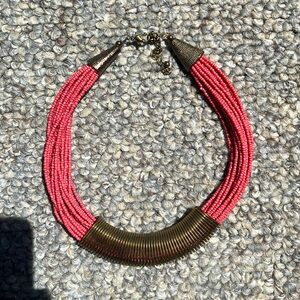 Pastel pink beaded necklace with flexible gold add on